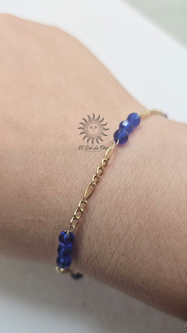 Pulsera con piedritas azuls/rojas